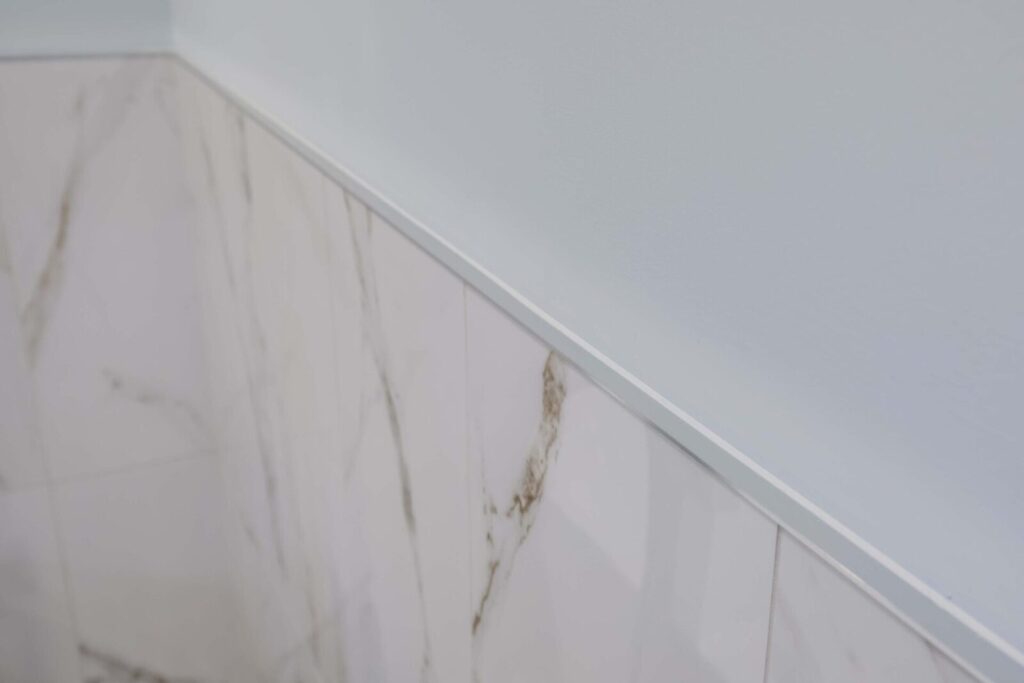 wall caulking in bathroom renovation for safety and leakage