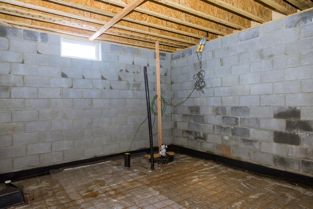 Concrete Preparation for Basement Lowering to Increase Height Basement lowering construction with concrete preparation for added height
