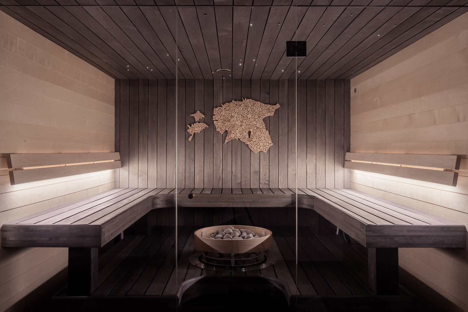 Finished wood-lined basement sauna after renovation by RenoDuck