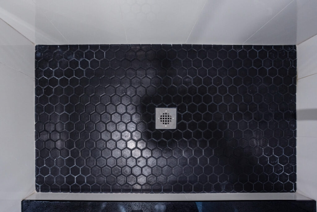 water drain installed in shower unit