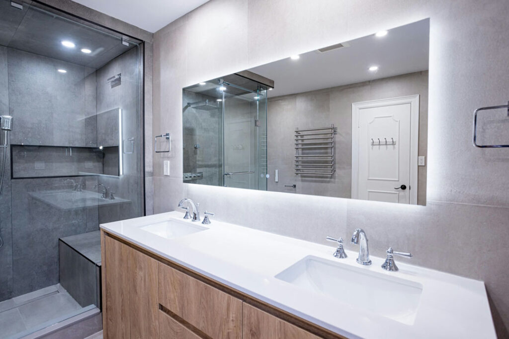 led light large bathroom mirror with wooden vanity and ceramic countertop with dual bsain