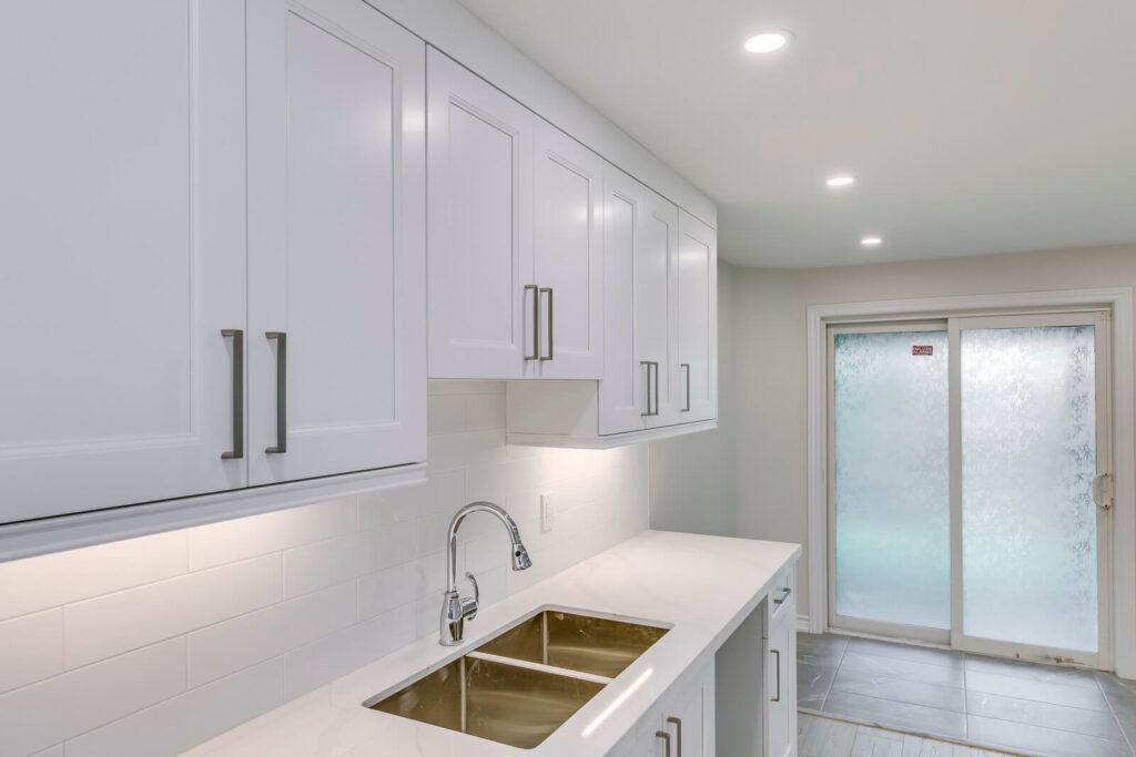 kitchen countertop with faucets installed with sink spcae