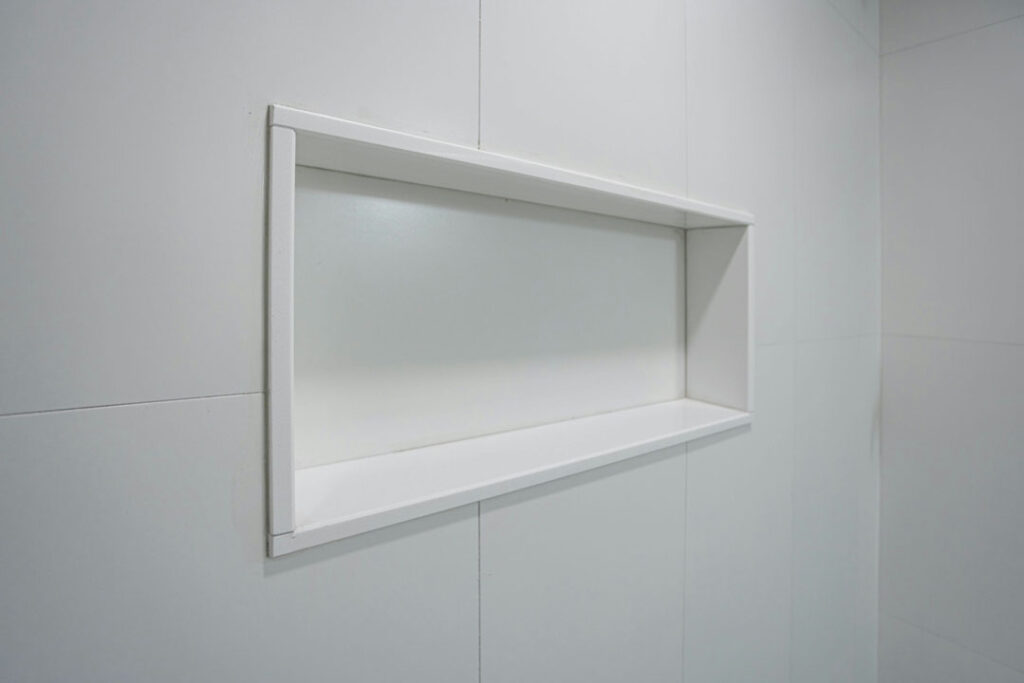wall built in shelf in shower unit for more space