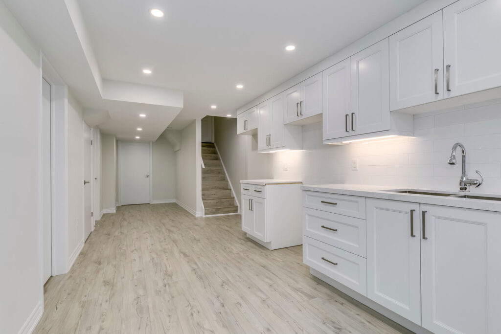 white kitchen with white cabinets and countertop