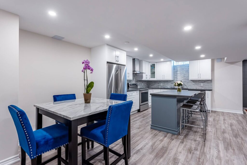 dinning table with island and cooking area renovatopn