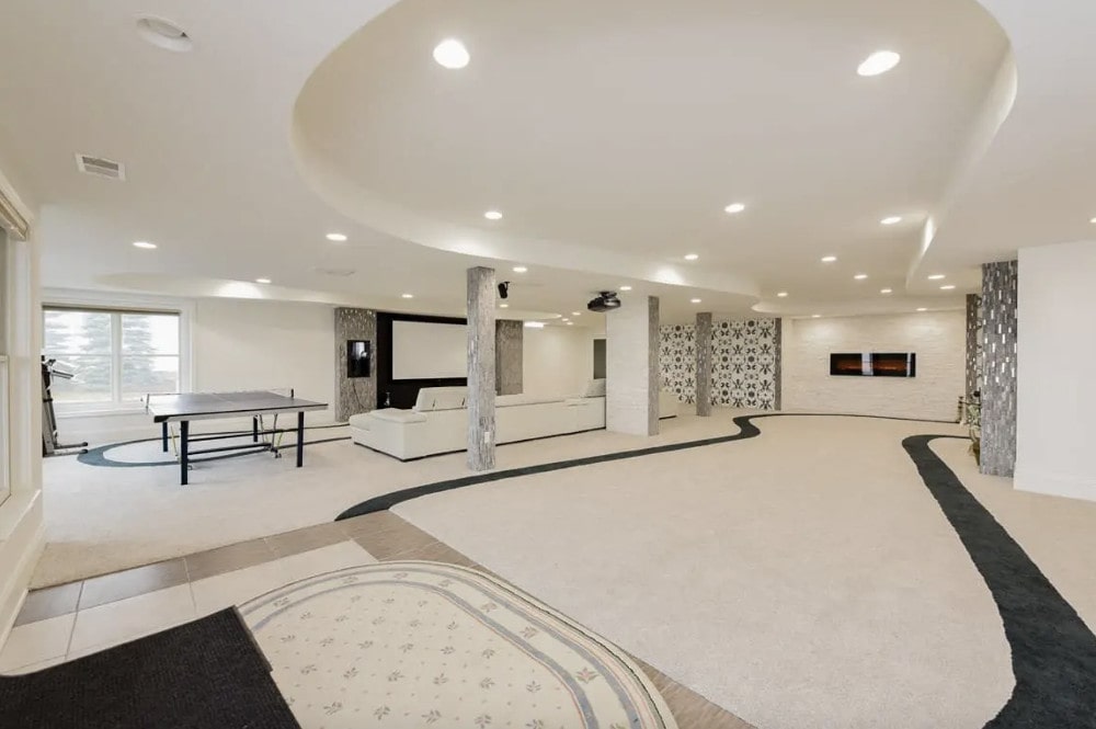 Plan budget with Purpose First: white basement with living room and gaming zone