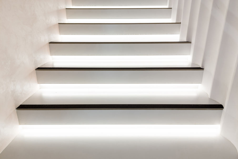 Modern open basement stairs with LED lighting